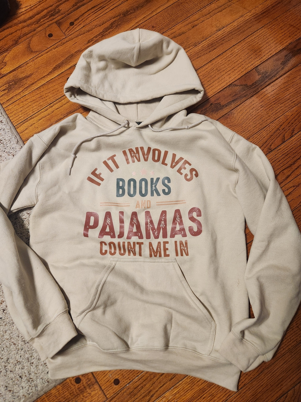 Women's Cream Graphic Hoodie - 'Books and Pajamas'